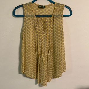 Yellow sleeveless blouse